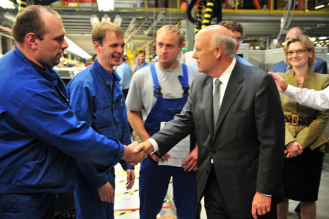General Motors Chairman and CEO Dan Akerson meets with workers at the GM factory in St. Petersburg, Russia, on Friday, June 22, 2012.
