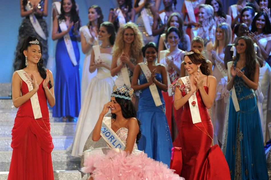 Miss Venezuela, Ivian Sarcos, reacts after being crowned Miss World 2011 in Earls Court in west London