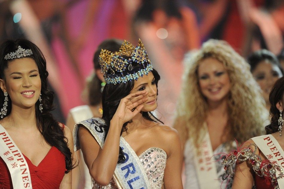  Miss Venezuela, Ivian Sarcos, reacts after being crowned Miss World 2011 in Earls Court in west London