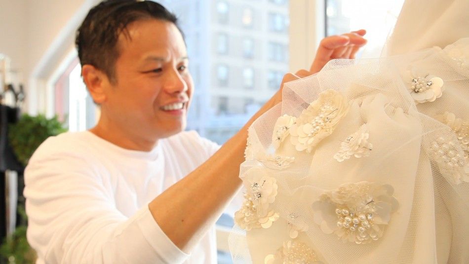 Designer Zang Toi puts the finishing touches on his Spring 2013 collection in his studio ahead of New York Fashion Week.