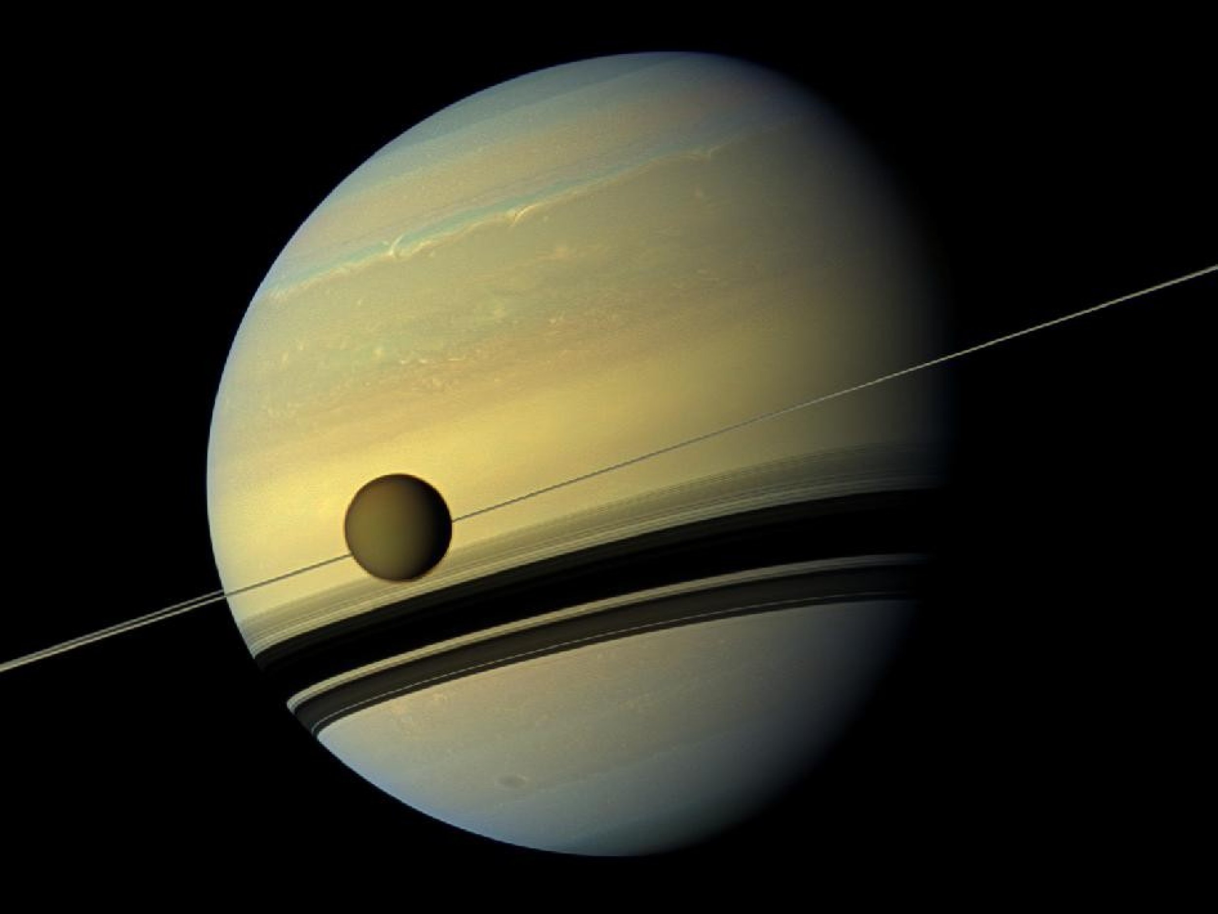 NASA Spacecraft Captures Spectacular Photos of Saturn And Titan