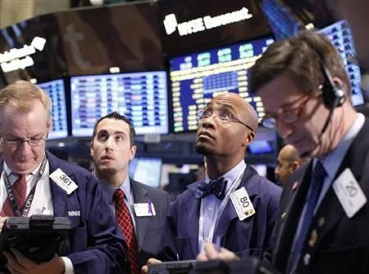 Traders work on the floor of the New York Stock Exchange