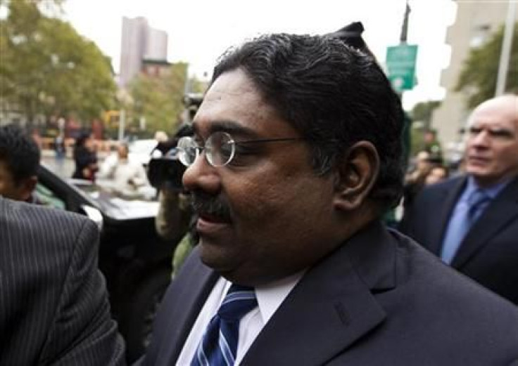 Galleon hedge fund founder Raj Rajaratnam departs Manhattan Federal Court after his sentencing in New York