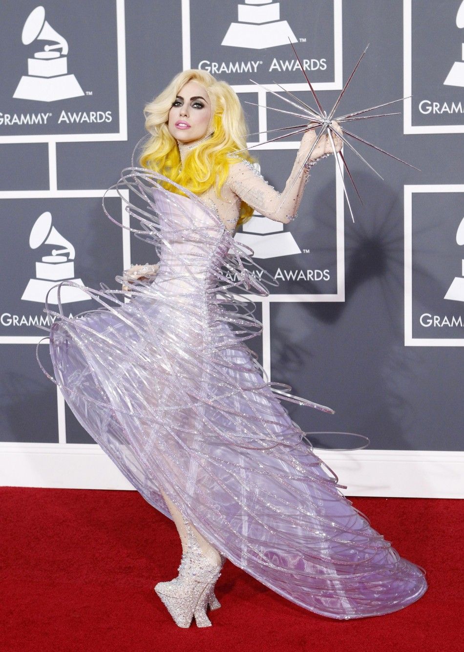 Lady Gaga poses on the red carpet at the 52nd annual Grammy Awards in Los Angeles