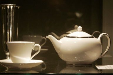 Tea pot and cup