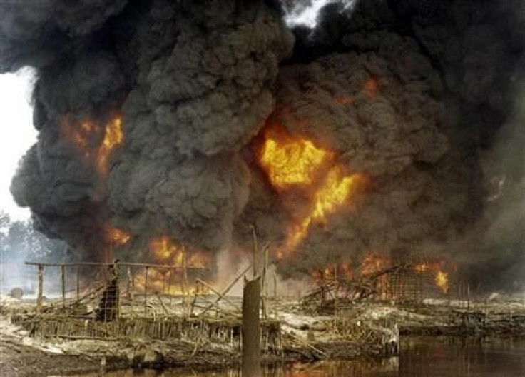 Smoke and flames billow from a burning oil pipeline in Nigeria