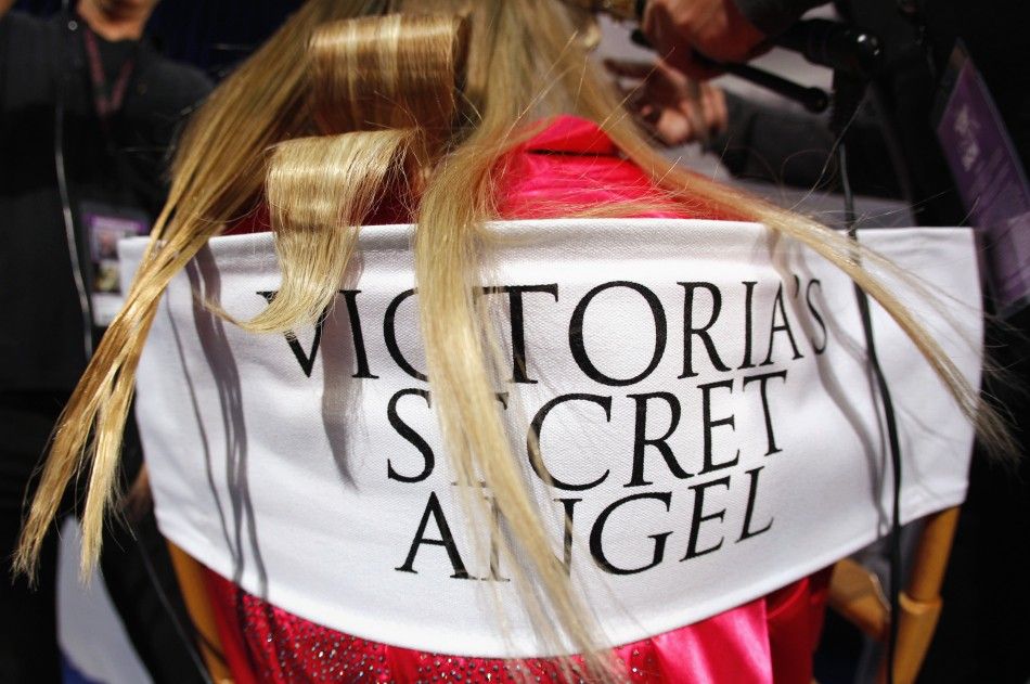 A Victorias Secret model gets her hair done backstage before the 2011 Victorias Secret Fashion Show in New York November 9, 2011. REUTERSMike Segar
