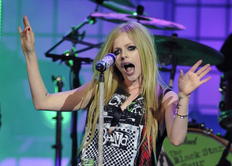 Avril Lavigne performs quotWhat the Hellquot during the MuchMusic Video Awards in Toronto