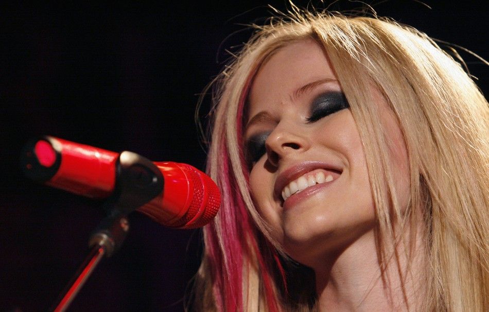 Avril Lavigne performs the song quotGirlfriendquot after the announcement of her 2008 Best Damn Tour in Los Angeles
