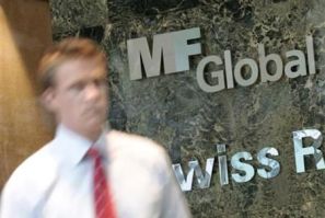 A man exits the office complex where MF Global Holdings Ltd have an office on 52nd Street in midtown Manhattan New York
