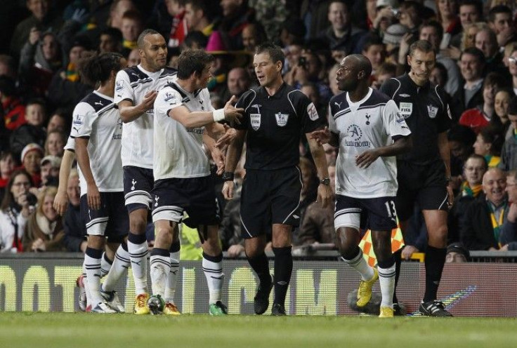 Tottenham Hotspur's players argue with referee Clattenburg after Nani scored for Manchester United during their English Premier League soccer match at Old Trafford in Manchester.