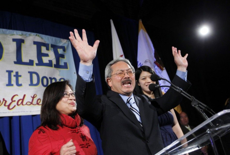 San Francisco Mayor Ed Lee reacts as his wife, Anita, looks on during his election day party in San Francisco