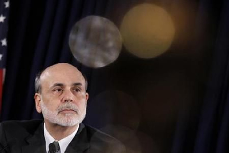 Federal Reserve Chairman Ben Bernanke pauses during a news conference following a two-day policy session in Washington