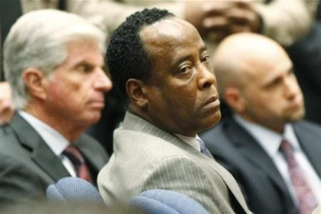  Conrad Murray next to his attorney, J. Michael Flanagan, after his guilty verdict on  November 7, 2011.