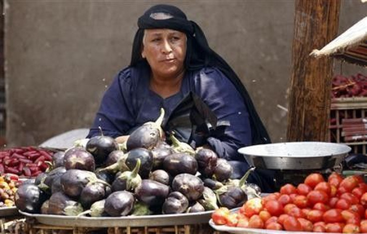 A vendor waits for customers at a vegetable market in Shubra on the outskirts of Cairo