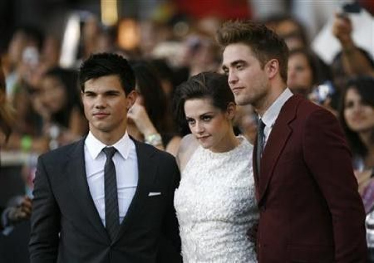 Cast members Taylor Lautner (L), Kristen Stewart and Robert Pattinson (R) pose at the premiere of &quot;The Twilight Saga: Eclipse&quot; during the Los Angeles Film Festival at Nokia theatre at L.A. Live in Los Angeles