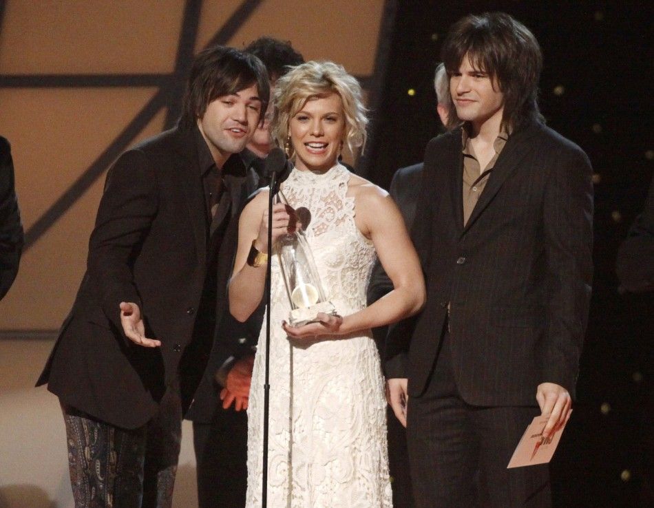 The Band Perry accept the award for single of the year for quotIf I Die Youngquot at the 45th Country Music Association Awards in Nashville
