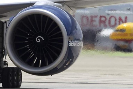 Engine exhaust is seen from an Aeromexico Boeing 777 as it landed marking the first ever commercial transatlantic flight using biofuel in Madrid