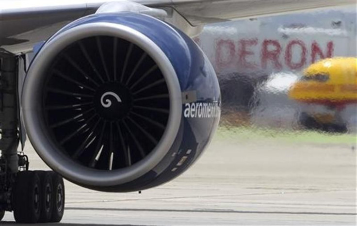 Engine exhaust is seen from an Aeromexico Boeing 777 as it landed marking the first ever commercial transatlantic flight using biofuel in Madrid