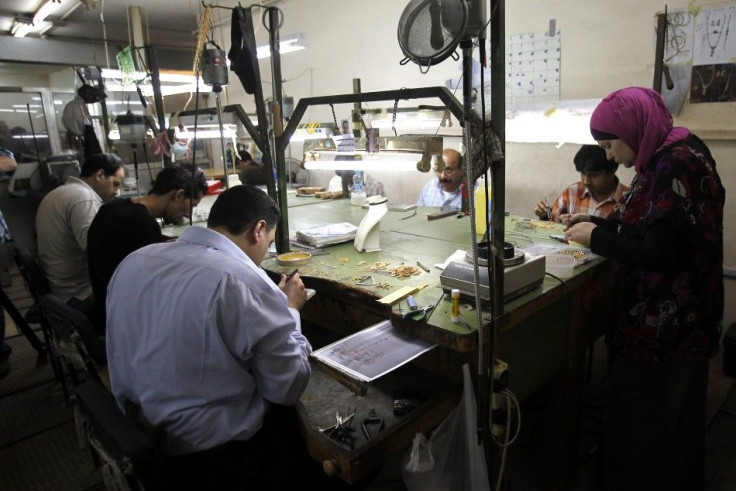 Employees of Ziad Al-Lama gold workshop in Amman