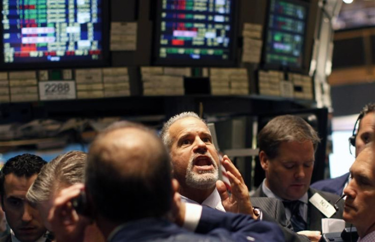Traders work on the main trading floor of the New York Stock Exchange