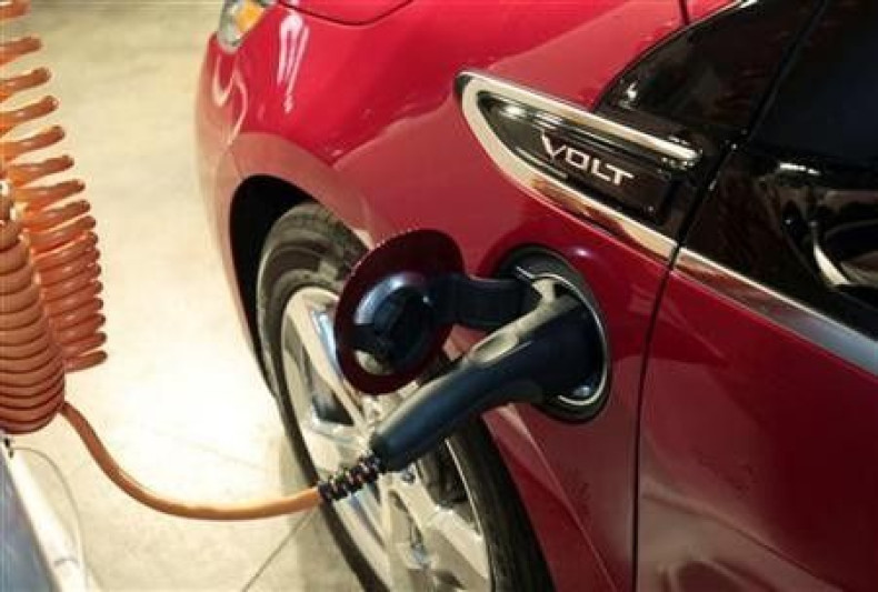 A Chevrolet Volt electric vehicle is plugged into a charging station during a news conference where GM Ventures announced an equity investment in Sunlogics Inc, a global solar energy systems provider specializing in solar project development and installat