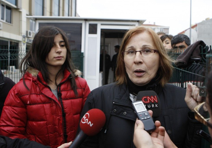 Former hostages Canset Usta and Sude Gundogdu of the hijacked Kartepe ferry speak to media outside a police station in the northwestern Turkish town of Silivri, near Istanbul