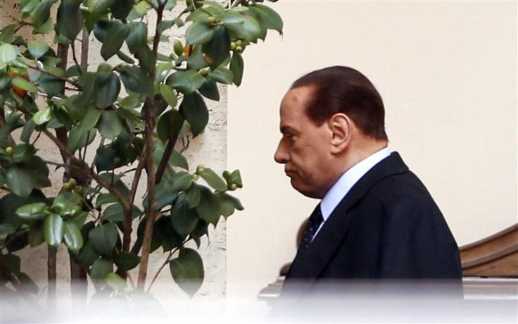 Italian Prime Minister Silvio Berlusconi leaves his residence downtown in Rome