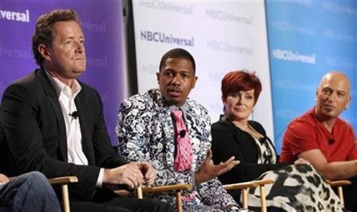 Host Nick Cannon (2nd L) and judges Piers Morgan (L), Sharon Osbourne and Howie Mandel attend the NBC panel for the television show &#039;&#039;America&#039;s Got Talent&#039;&#039; during the Television Critics Association summer press tour in Pasadena, 