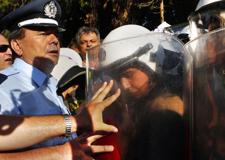 Greek Riot Police Clash With Colleagues On Strike
