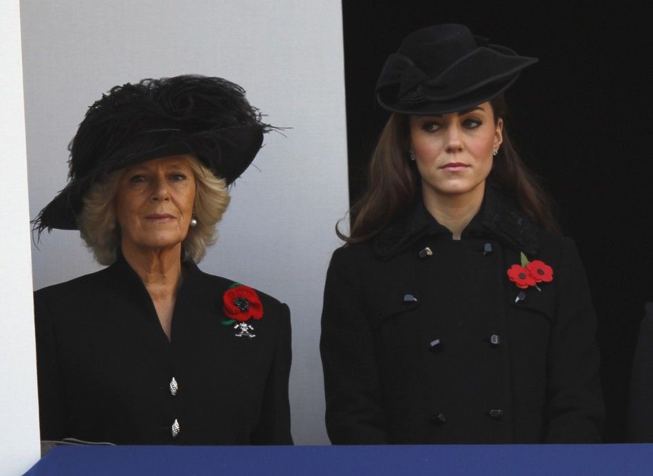 Camilla, Duchess of Cornwall L attends the annual Remembrance Sunday ceremony with Catherine, Duchess of Cambridge at the Cenotaph in London November 13, 2011.