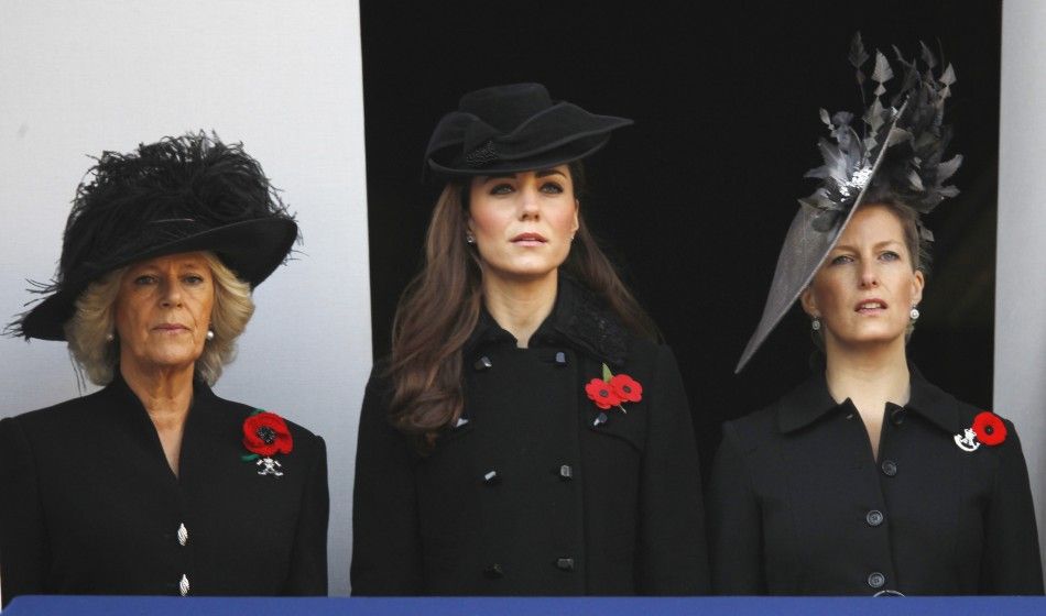 Camilla, Duchess of Cornwall L attends the annual Remembrance Sunday ceremony with Catherine, Duchess of Cambridge C and Sophie, Countess of Wessex at the Cenotaph in London November 13, 2011. 