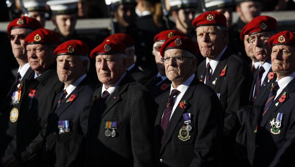 War veterans march past the Cenotaph during the annual Remembrance Sunday ceremony in London November 13, 2011. 