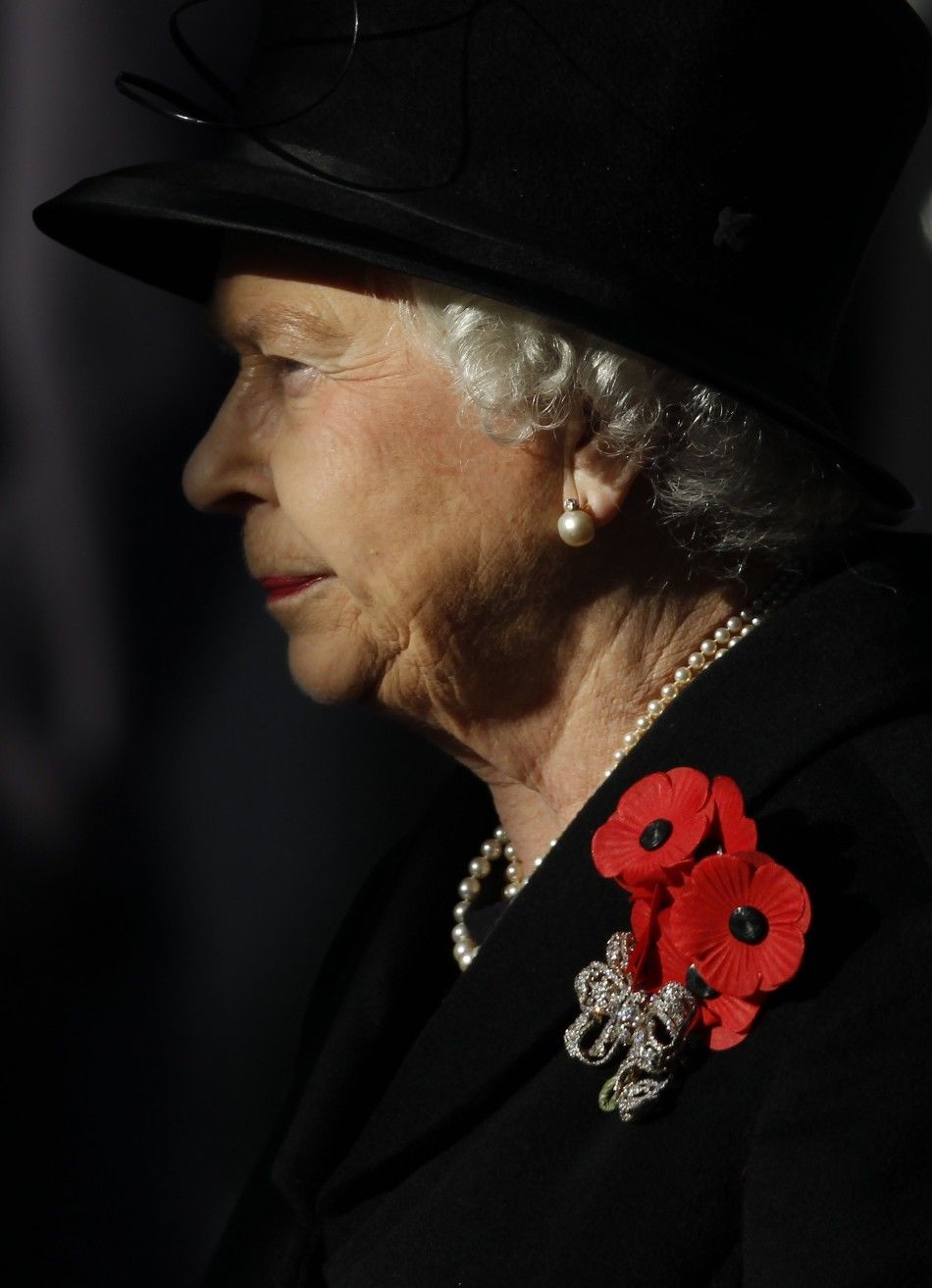 Britains Queen Elizabeth closes her eyes during the annual Remembrance Sunday ceremony at the Cenotaph in London November 13, 2011. 