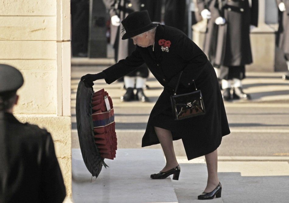 Britains Queen Elizabeth lays a wreath during the annual Remembrance Sunday ceremony at the Cenotaph in London November 13, 2011. 