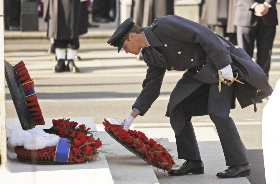 Britains Prince William lays a wreath during the annual Remembrance Sunday ceremony at the Cenotaph in London November 13, 2011. 
