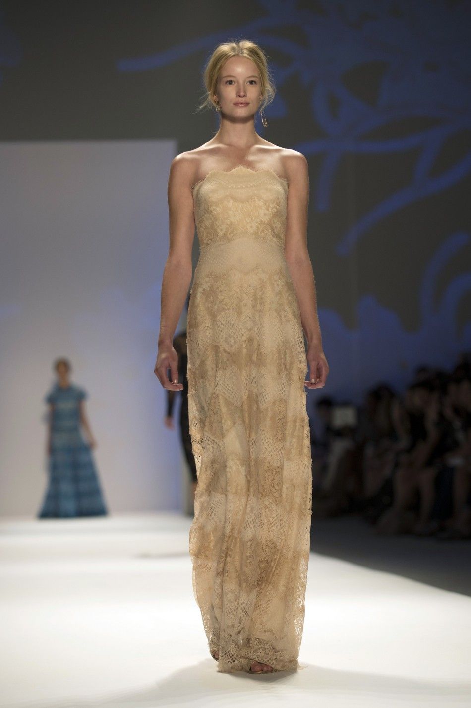 A model presents a creation from the Tadashi Shoji SpringSummer 2013 collection during New York Fashion Week September 6, 2012. 