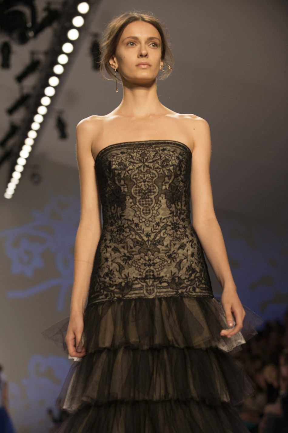 A model presents a creation from the Tadashi Shoji Spring 2013 collection during New York Fashion Week on September 6, 2012. 