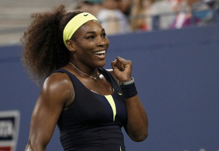 Serena Williams of the U.S. celebrates after defeating Ana Ivanovic of Serbia during their women&#039;s quarter-final match at the US Open tennis tournament in New York