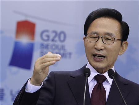 South Korean President Lee answers a reporter's question during a news conference regarding the upcoming G20 Summit at the presidential Blue House in Seoul
