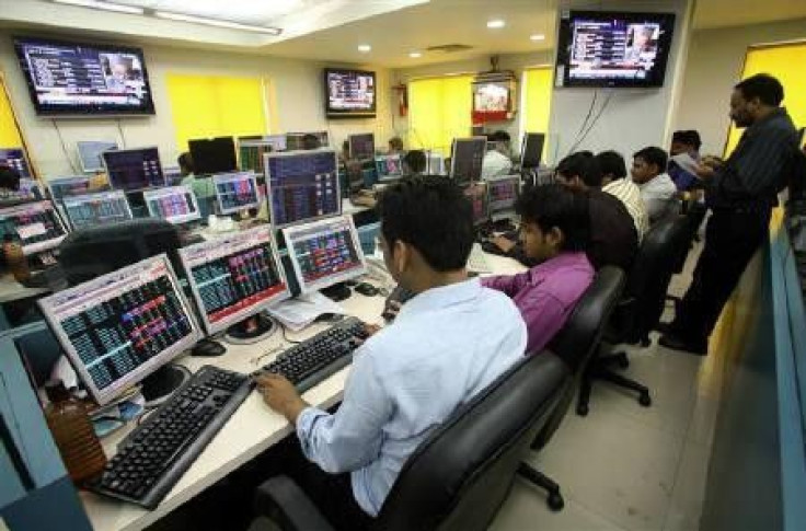 File photo of stock brokers trading in a brokerage firm in Kolkata February 16, 2009.