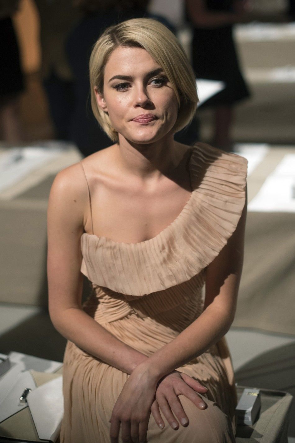 Australian actress Rachel Taylor poses for photographers before the presentation of the Donna Karan SpringSummer 2013 collection during New York Fashion Week September 10, 2012.