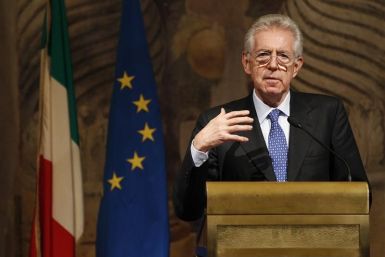 Newly appointed Prime Minister Mario Monti gestures during a news conference at Giustiniani Palace in Rome
