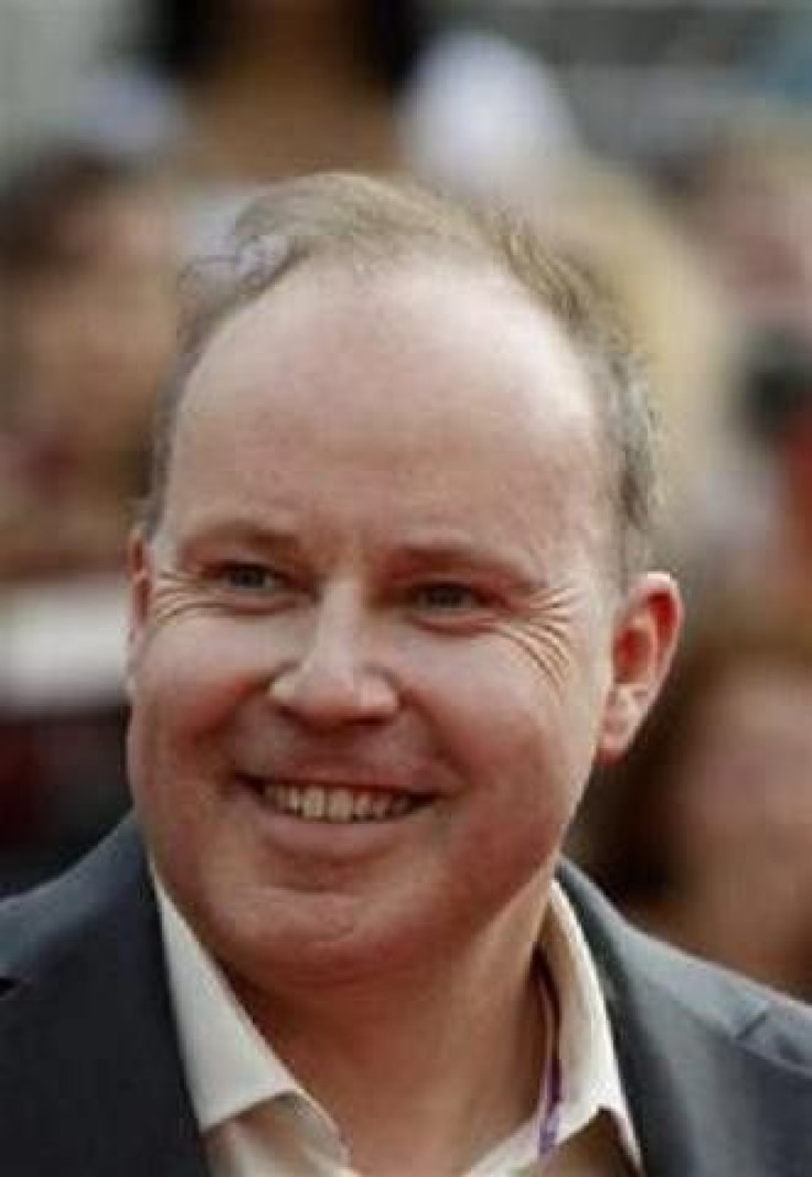 Director David Yates arrives for the premiere of the film ''Harry Potter and the Deathly Hallows: Part 2'' in New York July 11, 2011.
