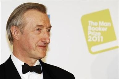British author Julian Barnes poses after winning the 2011 Man Booker Prize for Fiction with his book&#039; The Sense of an Ending&#039; at the Guildhall in London October 18, 2011.
