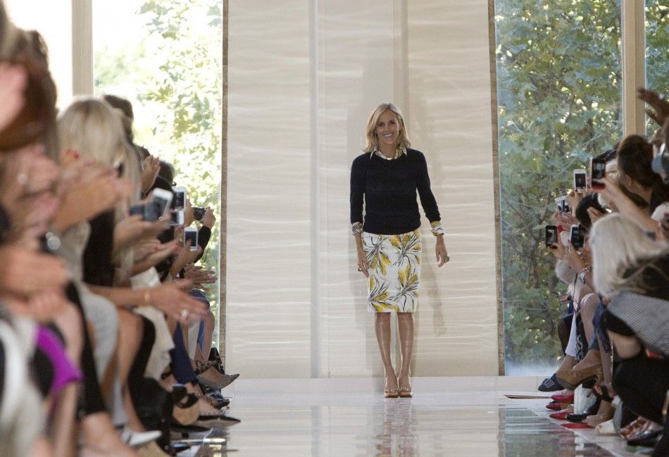 Tory Burch bows after her Spring 2013 collection show at Mercedes-Benz Fashion Week in New York