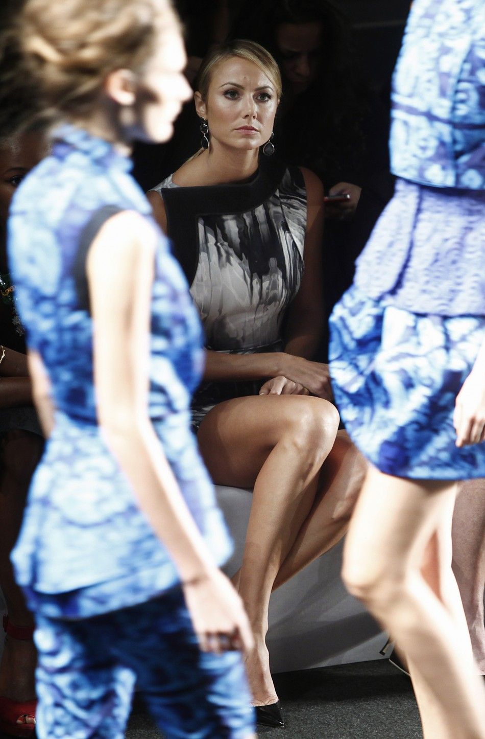 Actress Stacy Keibler watches the Vera Wang SpringSummer 2013 collection show at New York Fashion Week September 11, 2012. 