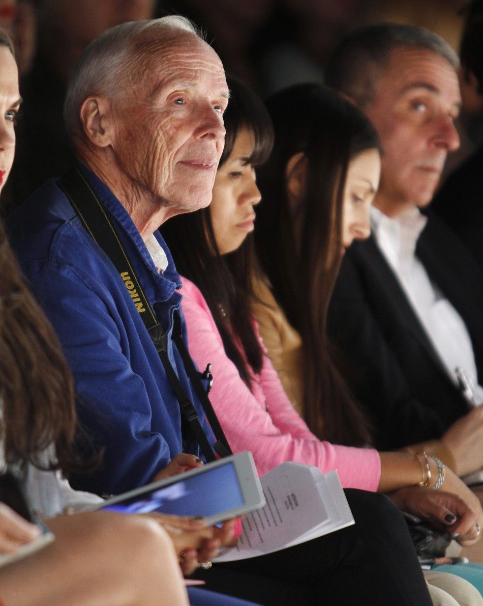 New York Times photographer Bill Cunningham sits in the front row during the Naeem Khan SpringSummer 2013 collection show at New York Fashion Week September 11, 2012.