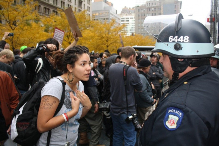 Protestor argues with NYPD over crowd control