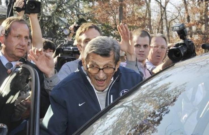 Joe Paterno getting out of car